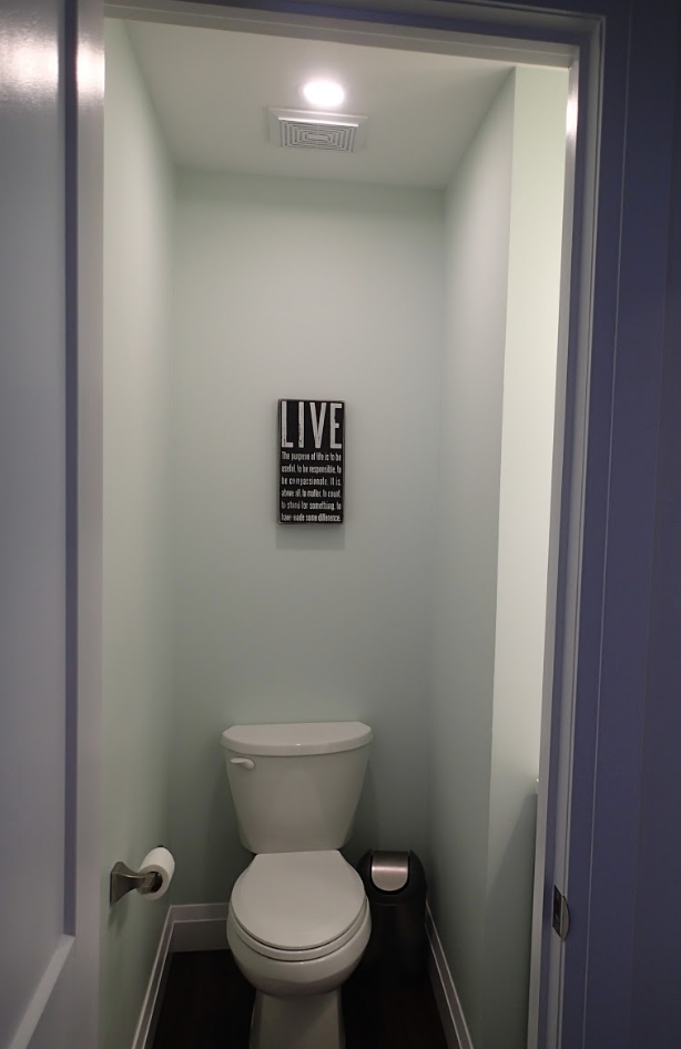 Small bathroom with a toilet, a