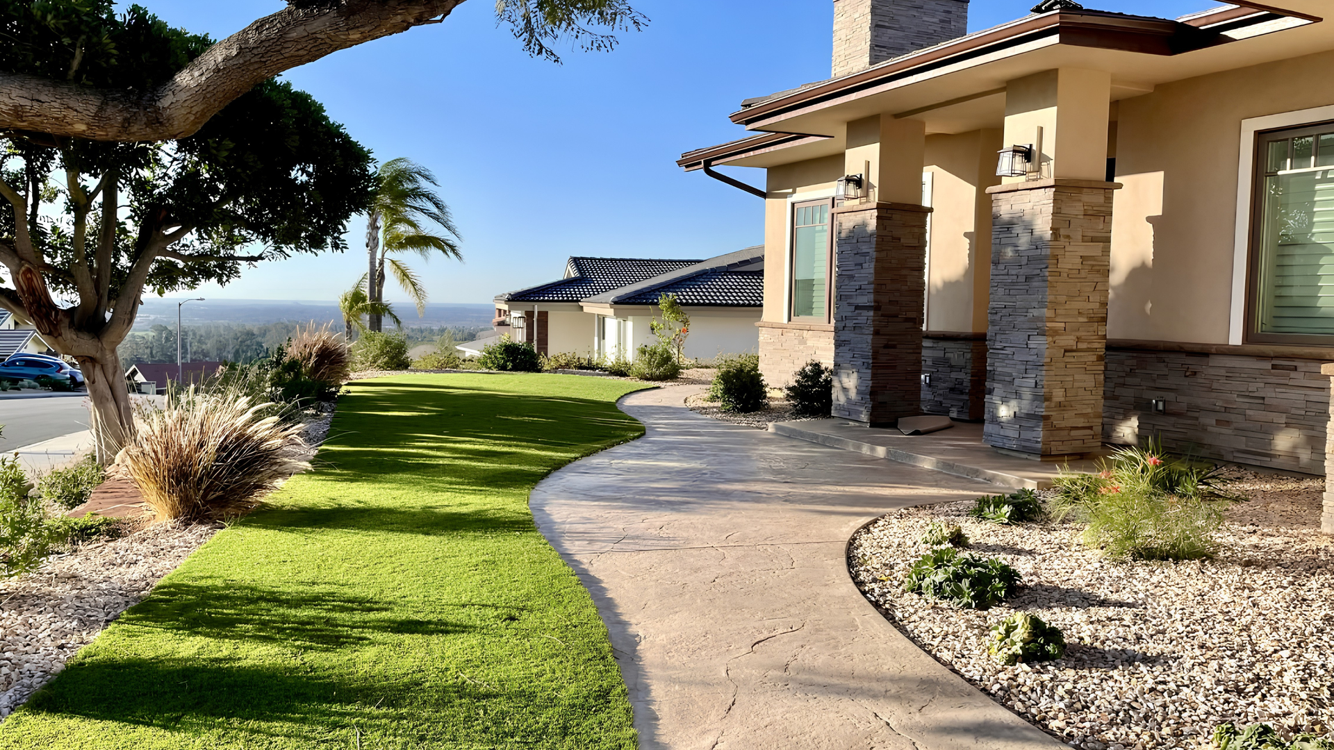 Concrete crew pouring a residential driveway on a mild California morning