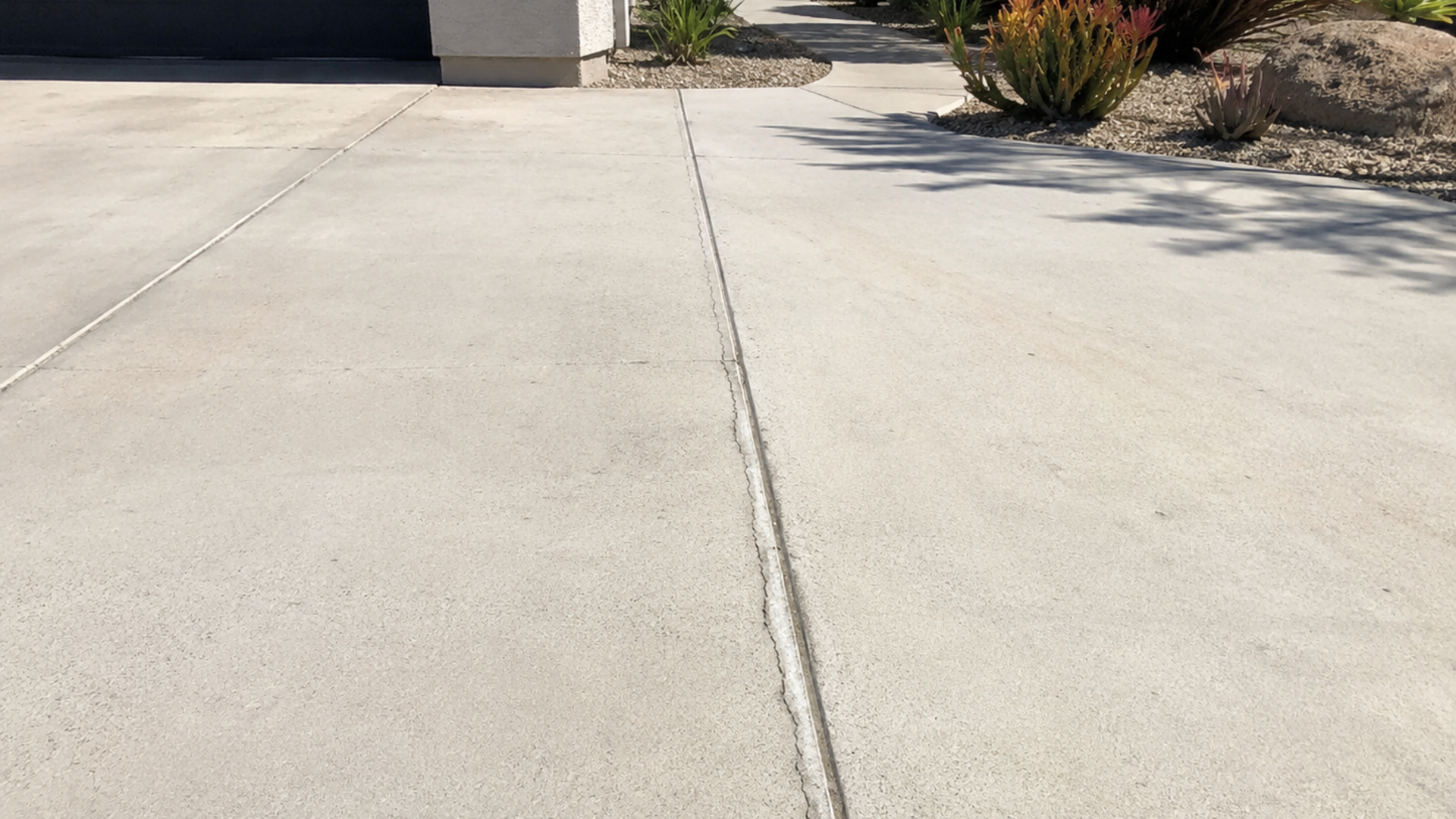 Drying shrinkage crack following a control joint in a concrete slab