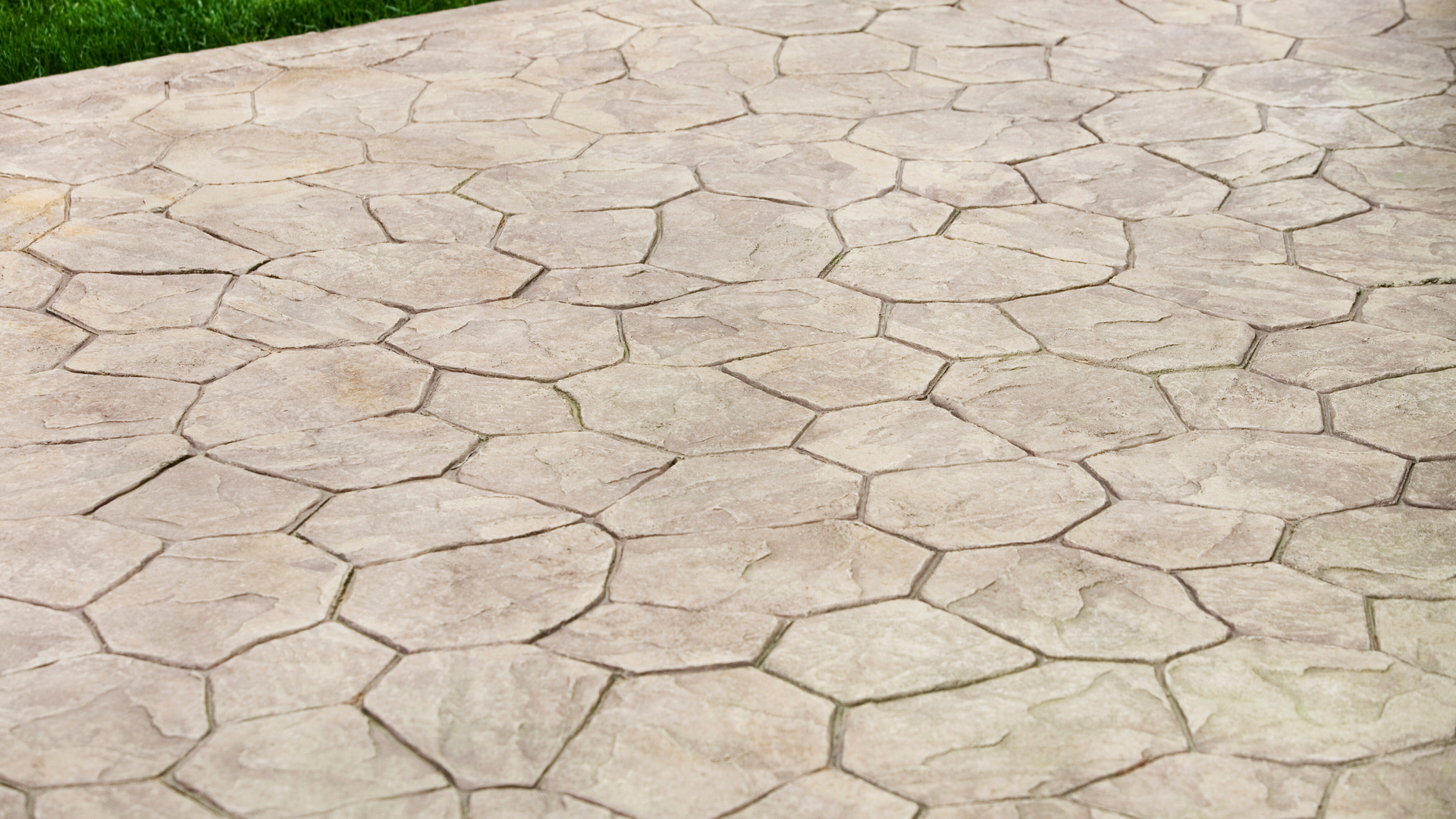 Stamped concrete patio and walkway installation by Stoneworks Construction Services for a Southern California home.