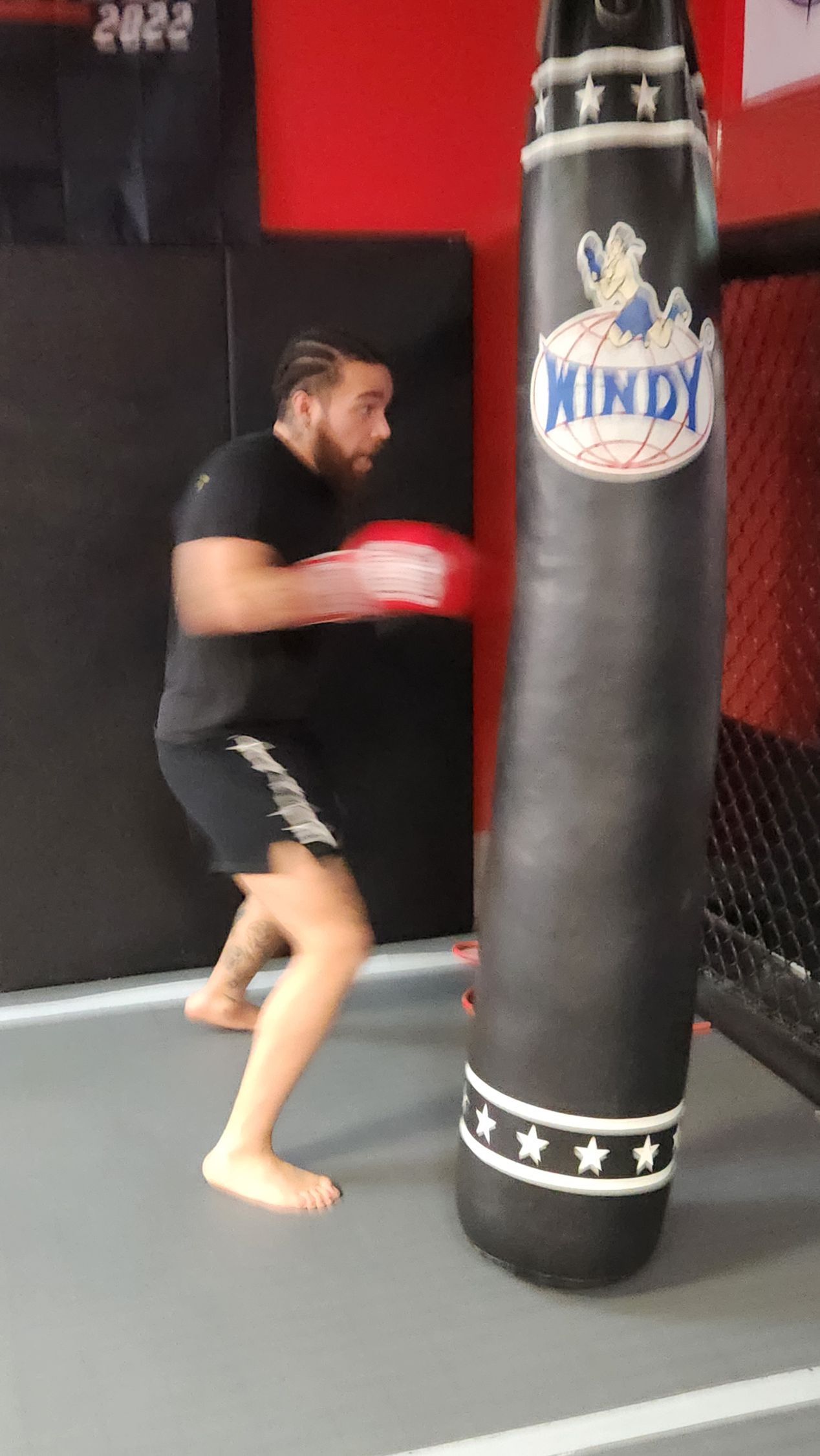 a man boxing with bag