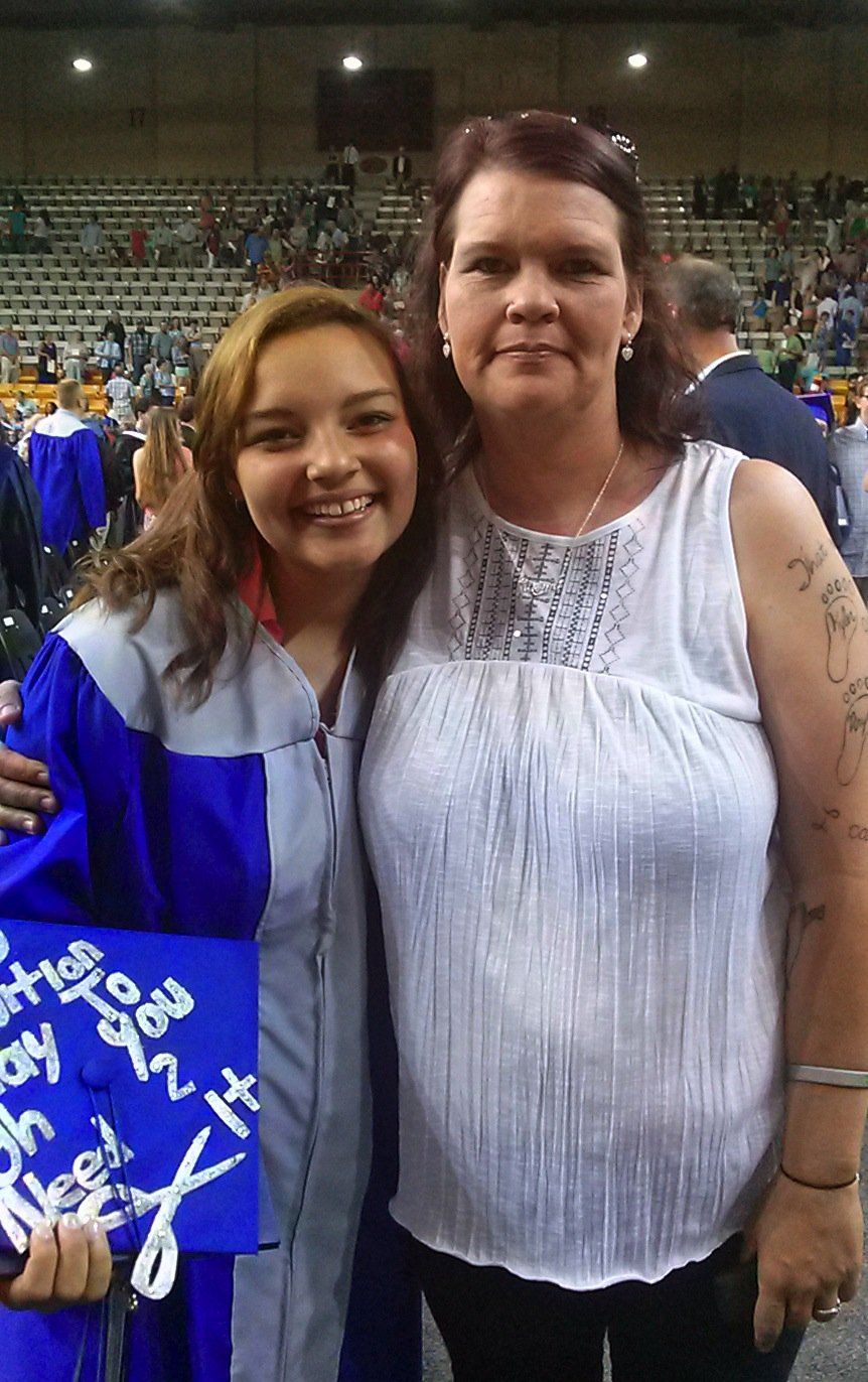 Kiara at graduation with her mom.