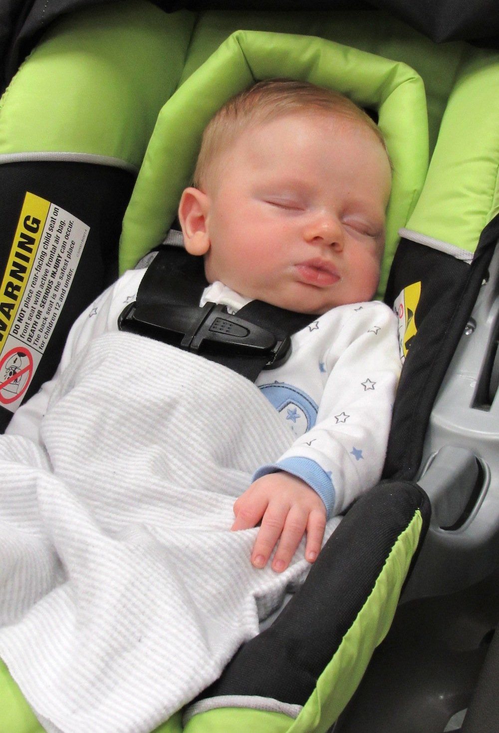 Oliver, baby in his carseat.