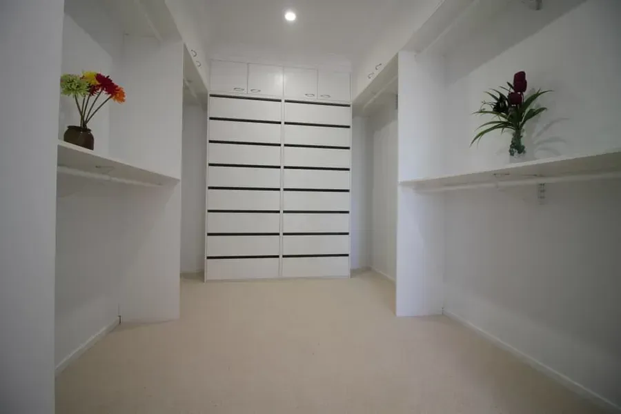 Empty White Walk-in Closet With Shelves — JRB Joinery In Kew, NSW