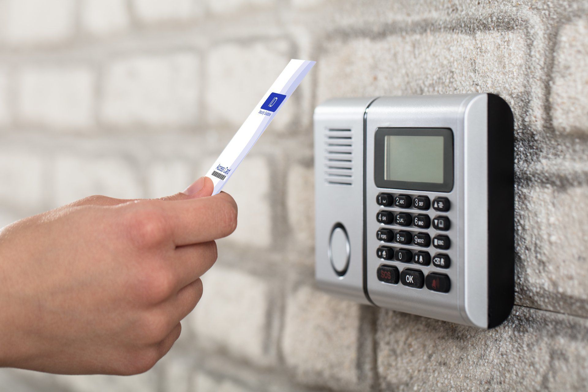 Person Using Key Card to Unlock the Door