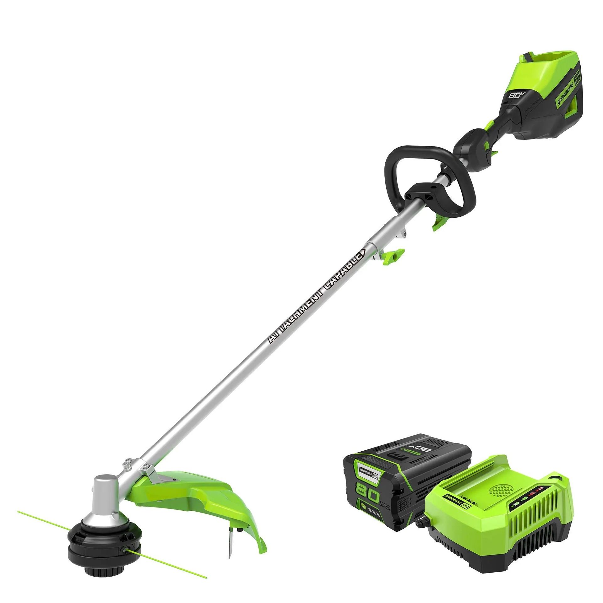 A Brush Cutter With a Battery and Charger on a White Background  — Diamond Service Centre In Lismore, NSW
