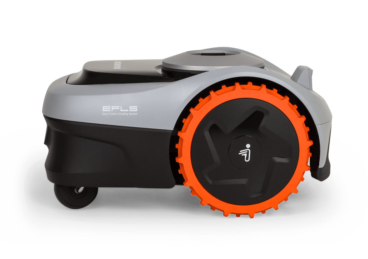 Robot Lawnmower on A Grassy Lawn in A Park, Surrounded by Trees  — Diamond Service Centre In Lismore, NSW