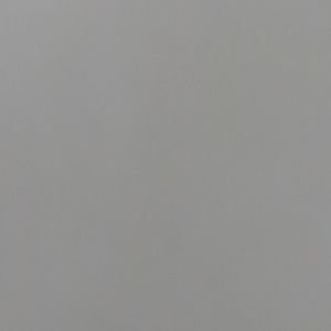 Plain gray surface with subtle shading and no distinct objects.