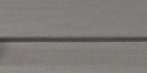 Close-up of linen vinyl siding.