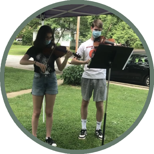 boy and girl playing violin