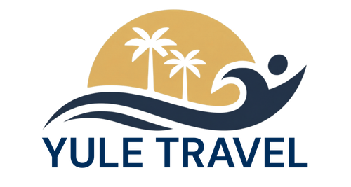 Yule Travel logo with palm trees, sun, and wave in gold, navy, and white