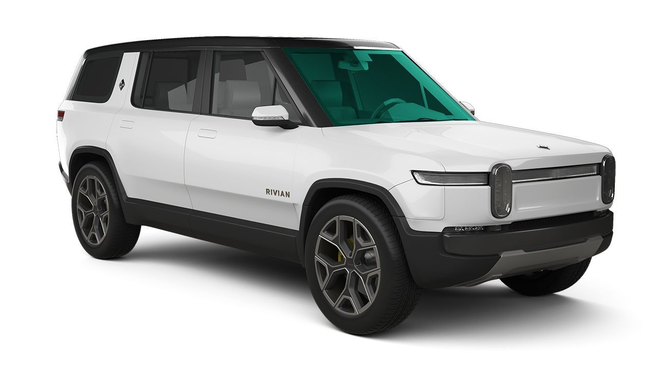 White Rivian electric SUV on a white background, shown in three-quarter front view.
