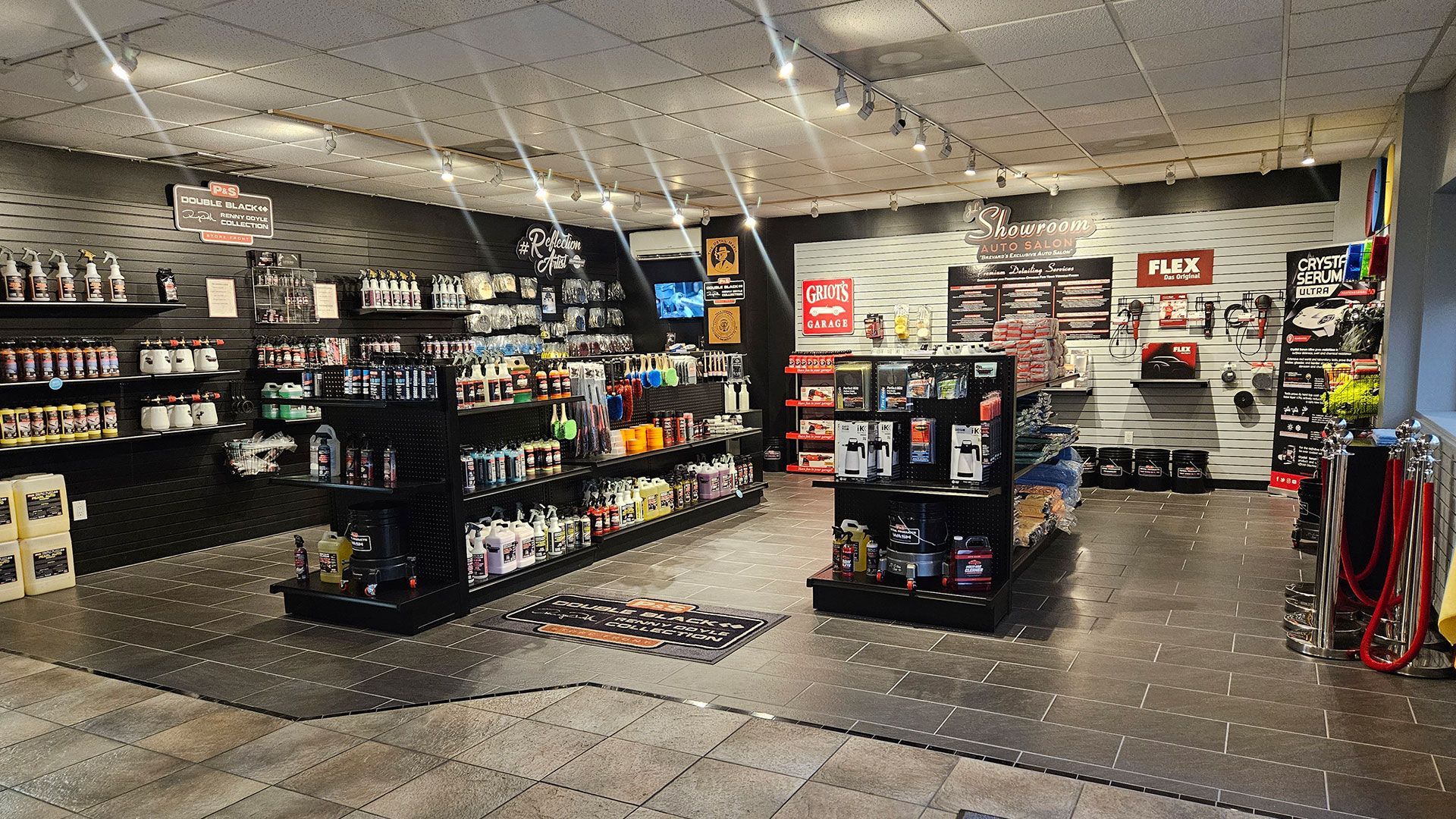 A store with a lot of shelves and a sign that says ' black ' on it