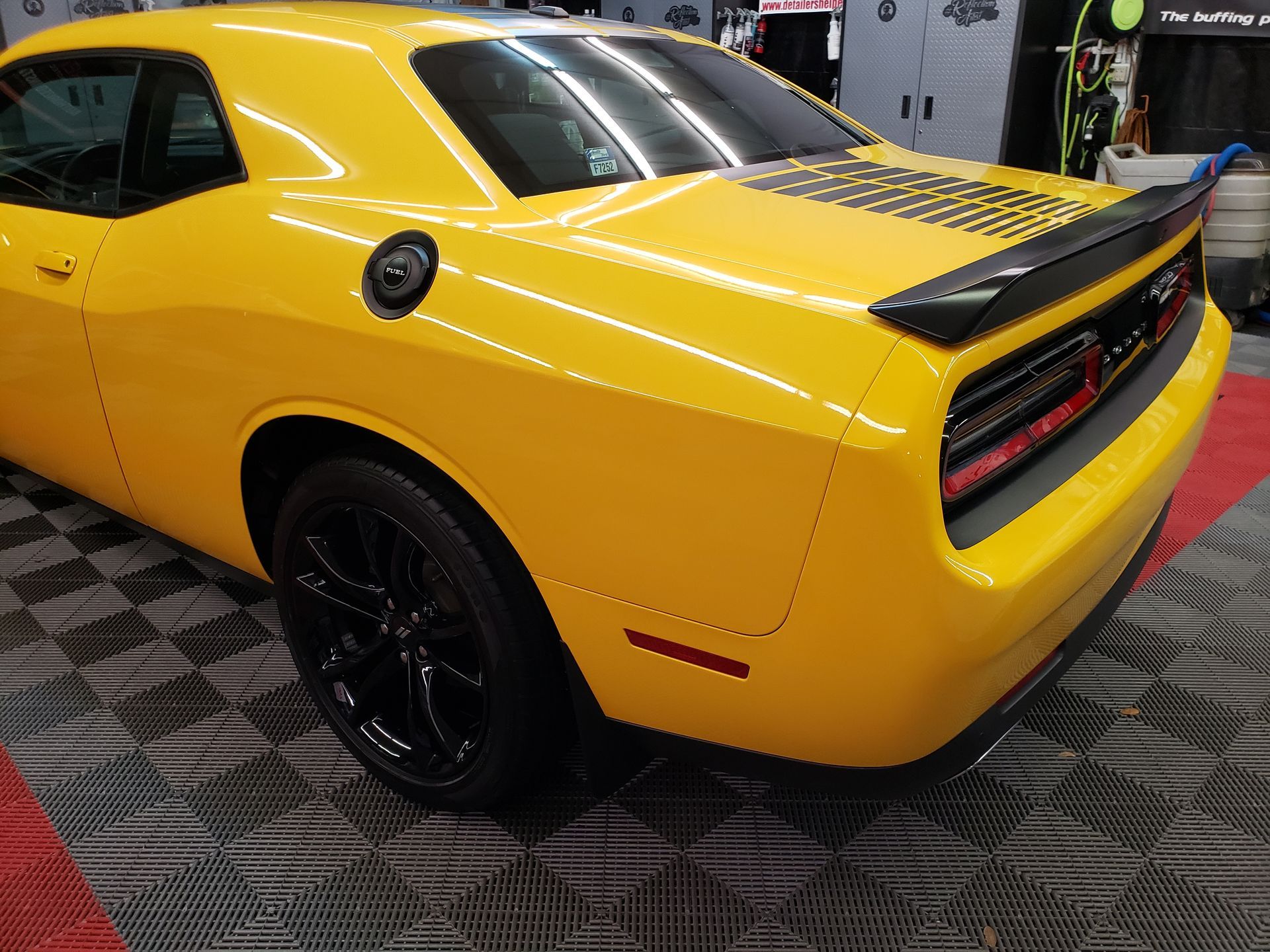 professional ceramic coating for a yellow challenger