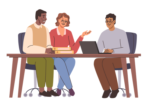 Three people in a meeting at a table with a laptop, books, and chairs. One person gestures.