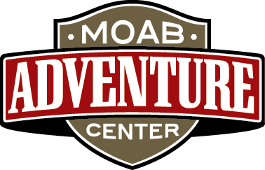 Moab Adventure Center logo: Red and white text on a brown and black shield. 