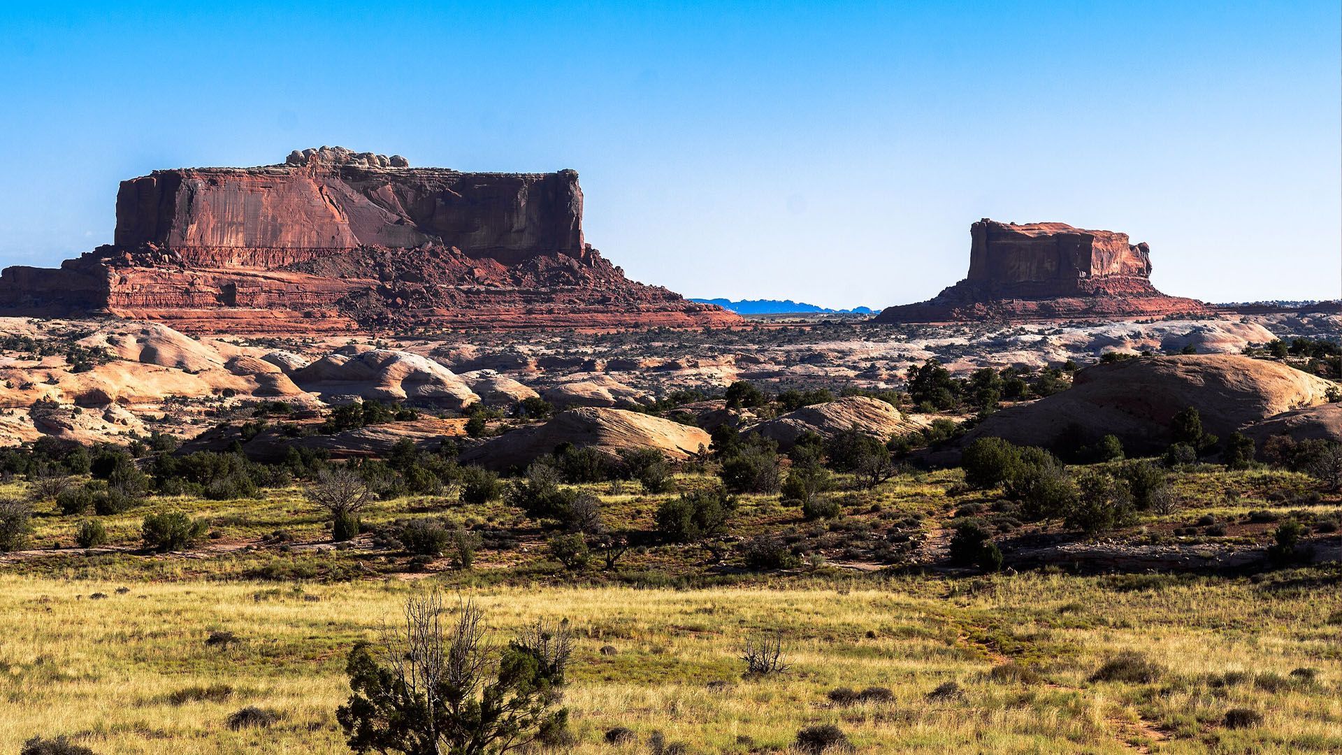 Two large buttes show on the horizon showing where the monitor and merrimac 4x4 trail goes.
