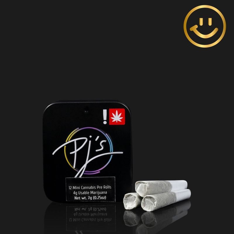 Black package labeled “Pj’s” with white rolled tips and a gold smiley icon on a dark background