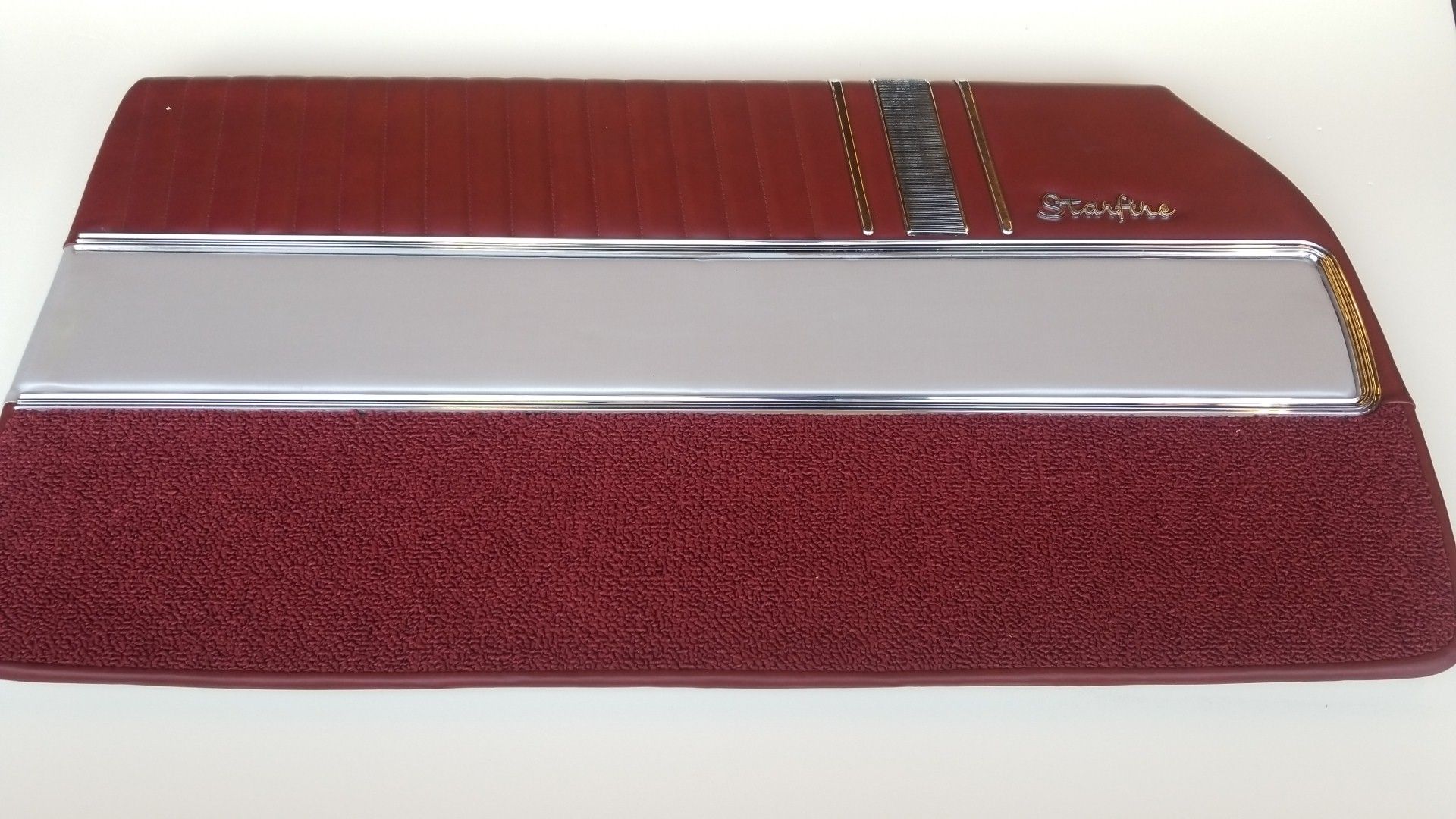Red textured serving tray with a silver center strip and trim on a white background
