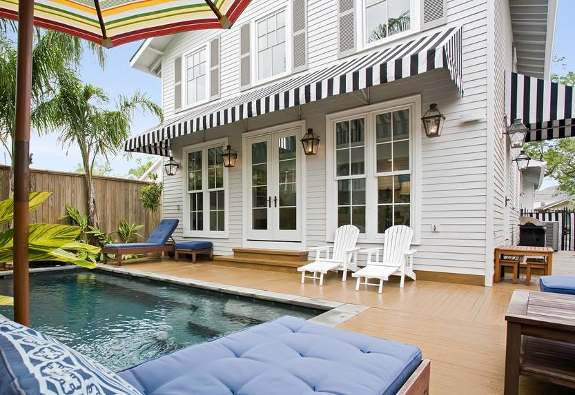 Black & White Awnings Near The Pool — Studio Curtains & Blinds in Mount Gravatt, QLD