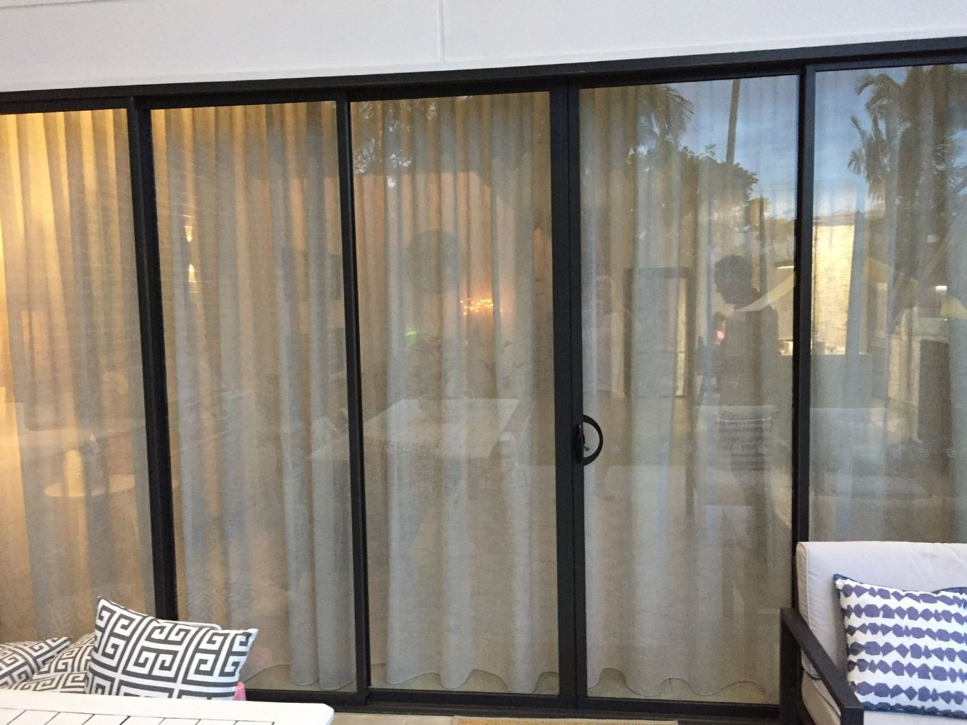 Glass Door With Curtains — Studio Curtains & Blinds in Brisbane Southside, QLD