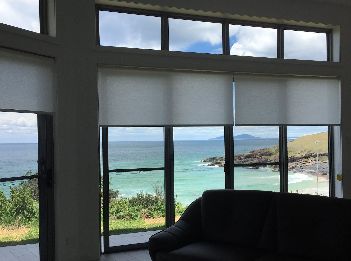 Roller Blinds With A View Of The Ocean — Studio Curtains & Blinds in Brisbane Southside, QLD