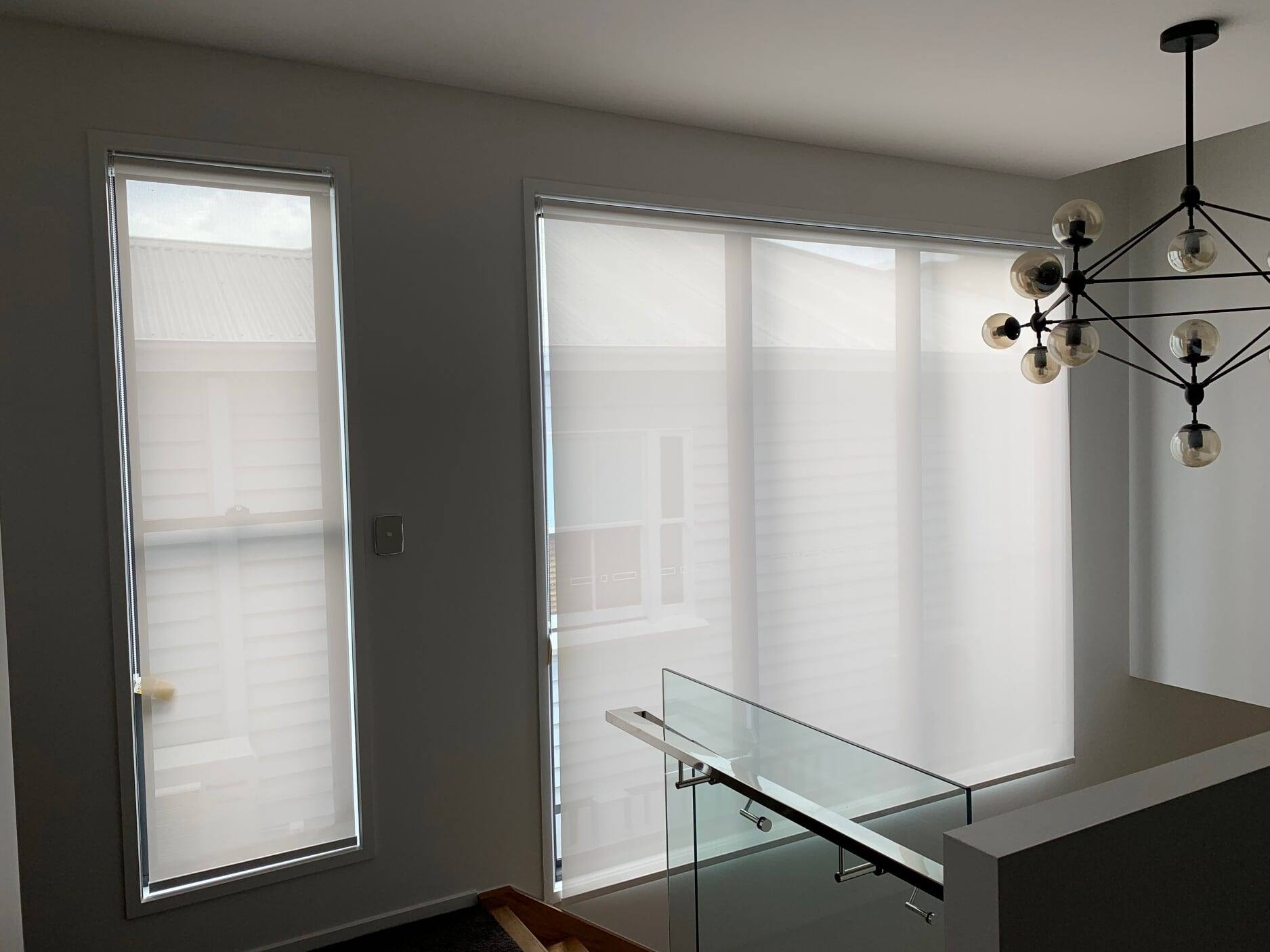 Roller Blinds Installed On A Window Stairs — Studio Curtains & Blinds in Mount Gravatt, QLD