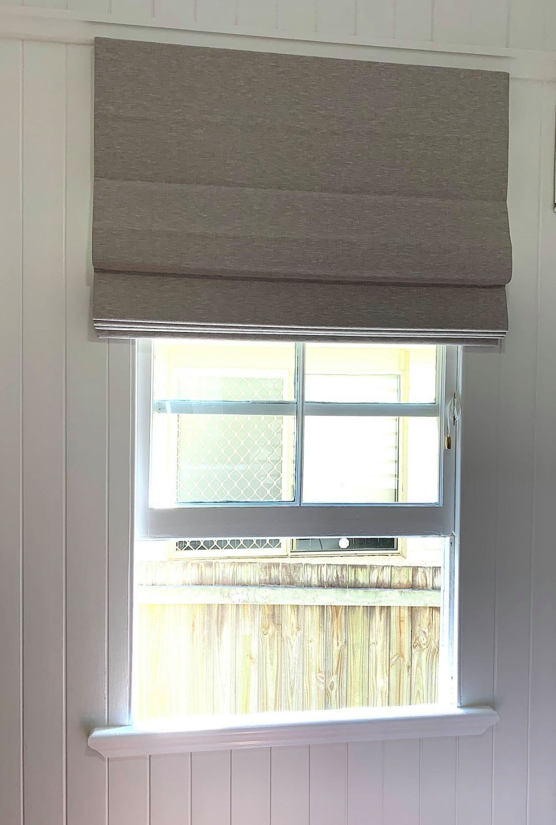 Roman Blinds On A Window — Studio Curtains & Blinds in Mount Gravatt, QLD