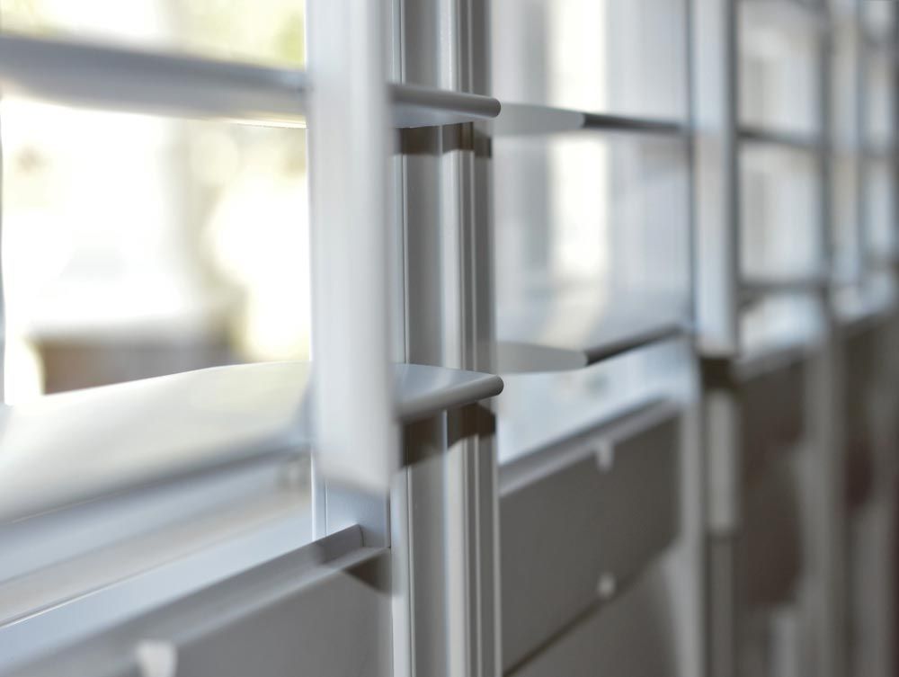 Closeup On A White Plantation Shutters — Studio Curtains & Blinds in Mount Gravatt, QLD