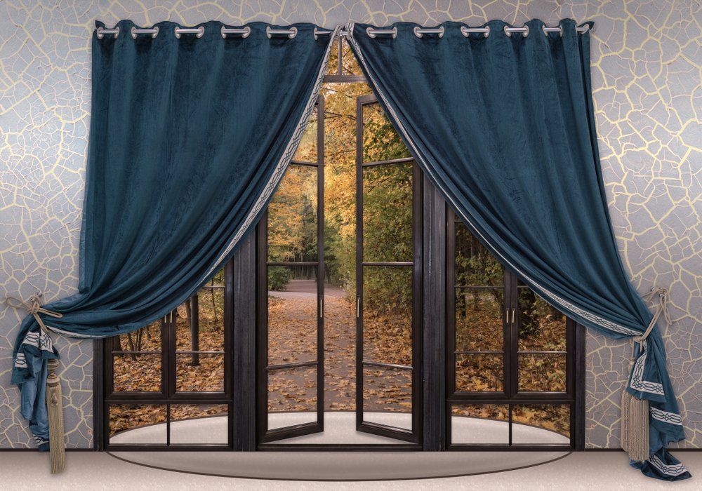 Blue Velvet Curtains In The Doorway — Studio Curtains & Blinds in Mount Gravatt, QLD