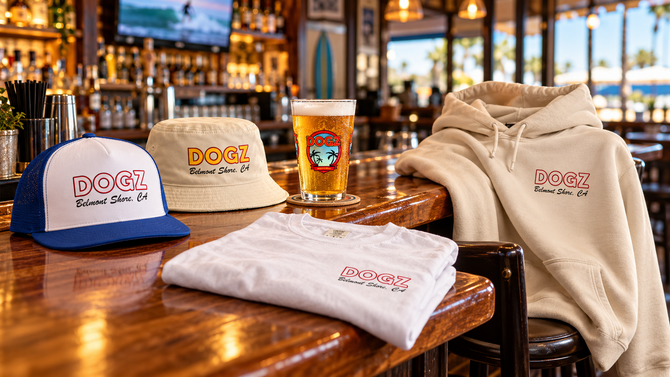 DOGZ Bar & Grill shirts and hats on the bar