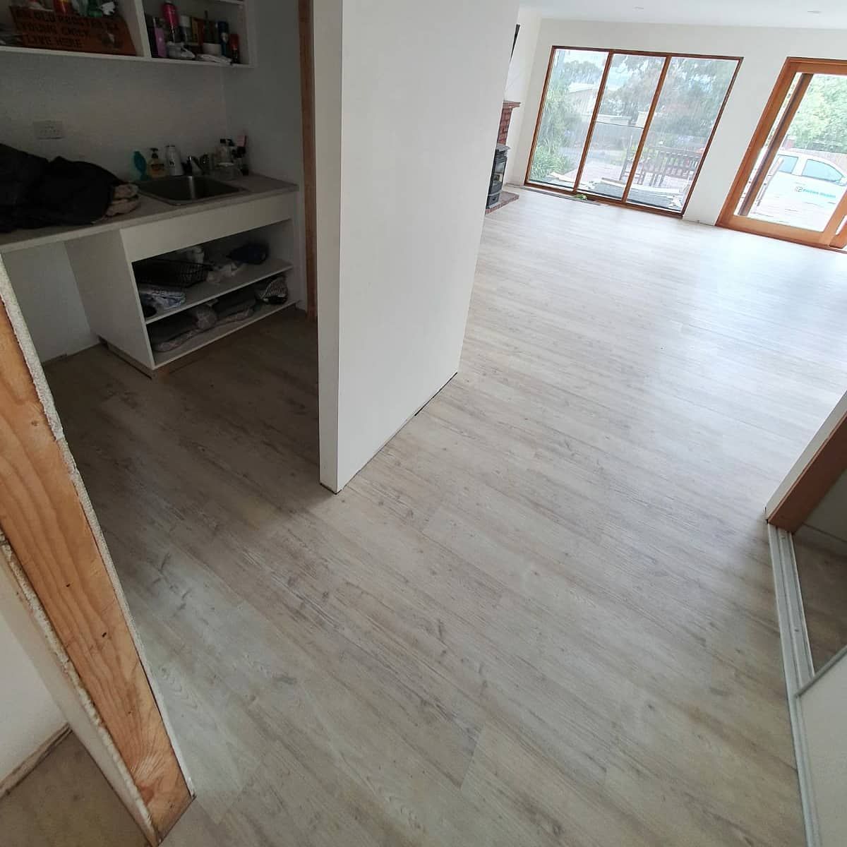 Bright Empty Room With Light Wood Floors — Unique Floors In New Town, TAS