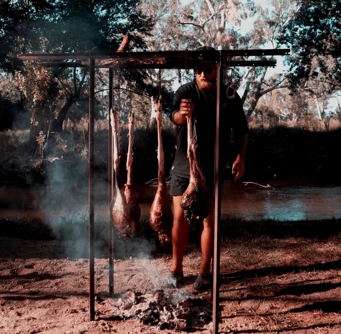 Hanging over coals