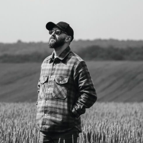 farmer looking at the horizon