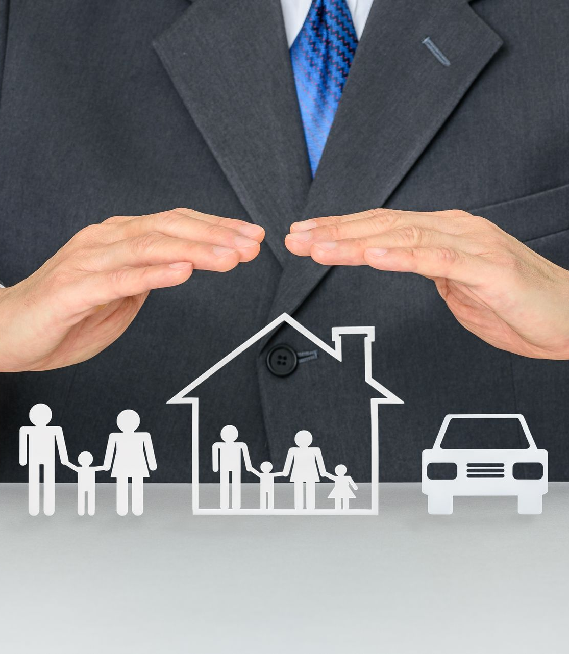 Hands over cutout of house, family, and car, suggesting protection or insurance. GMS Legal & Conveyancing In 38 Canton Beach Rd, Toukley