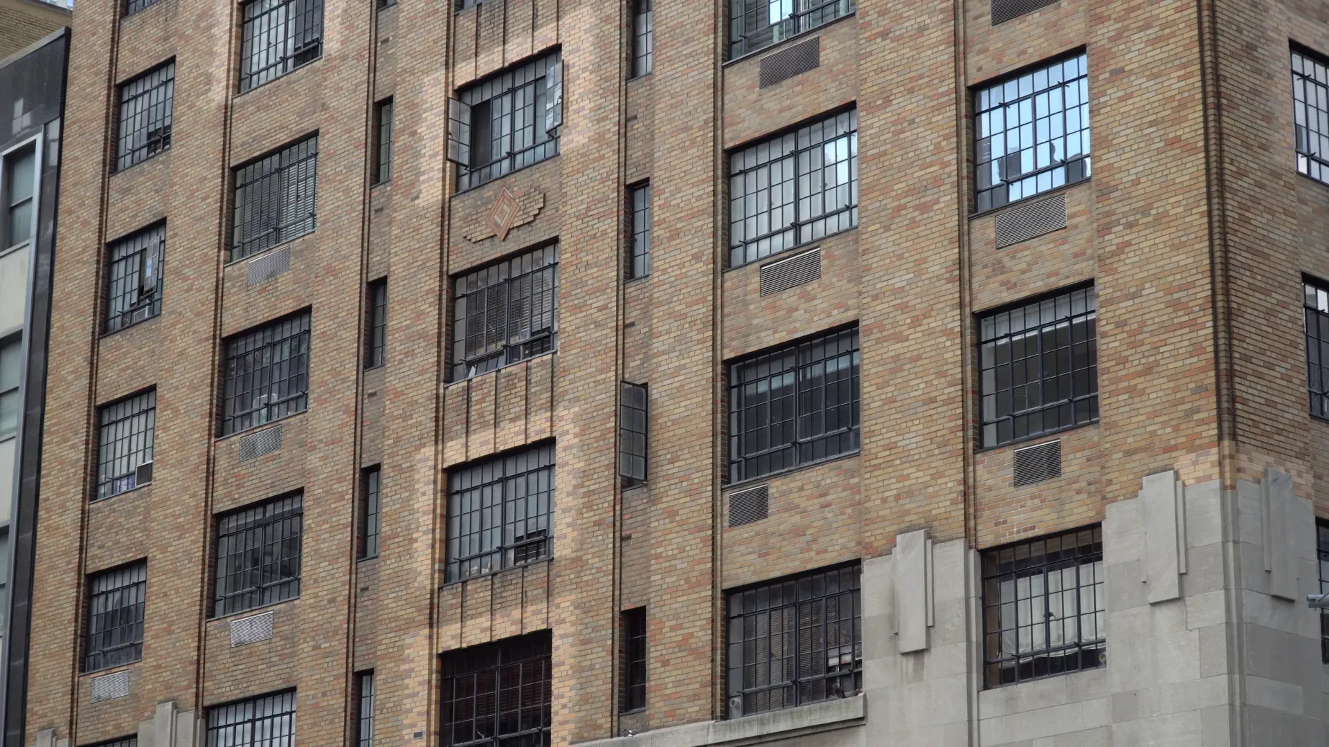 A large brick building representing the topic of real estate law.