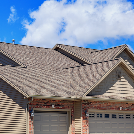 Asphalt shingle roofing on a residential home in Spring Hill, FL
