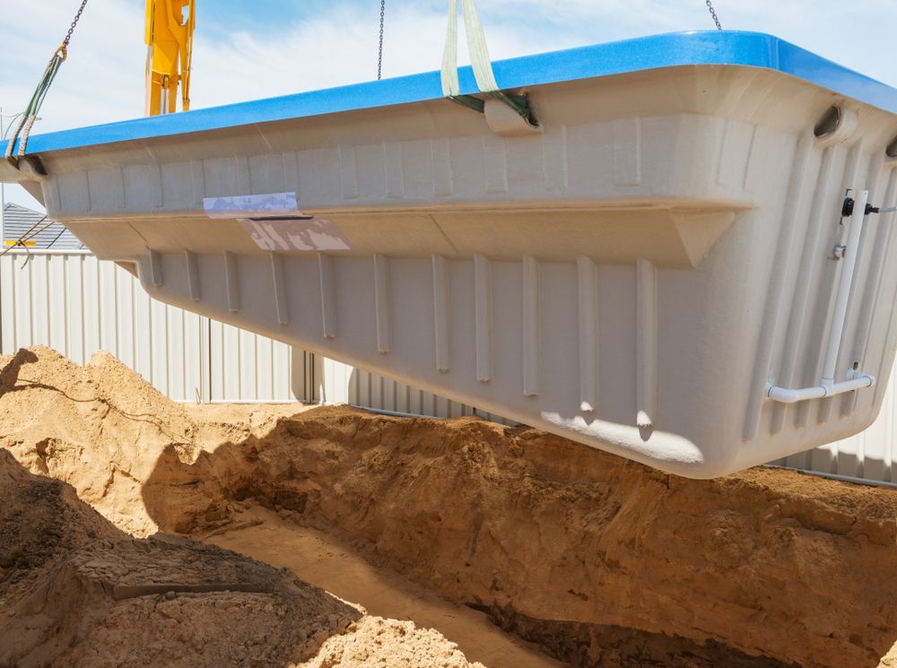 A Swimming Pool is Being Built in a Construction Site — Aqualine Pools in Coral Cove, QLD