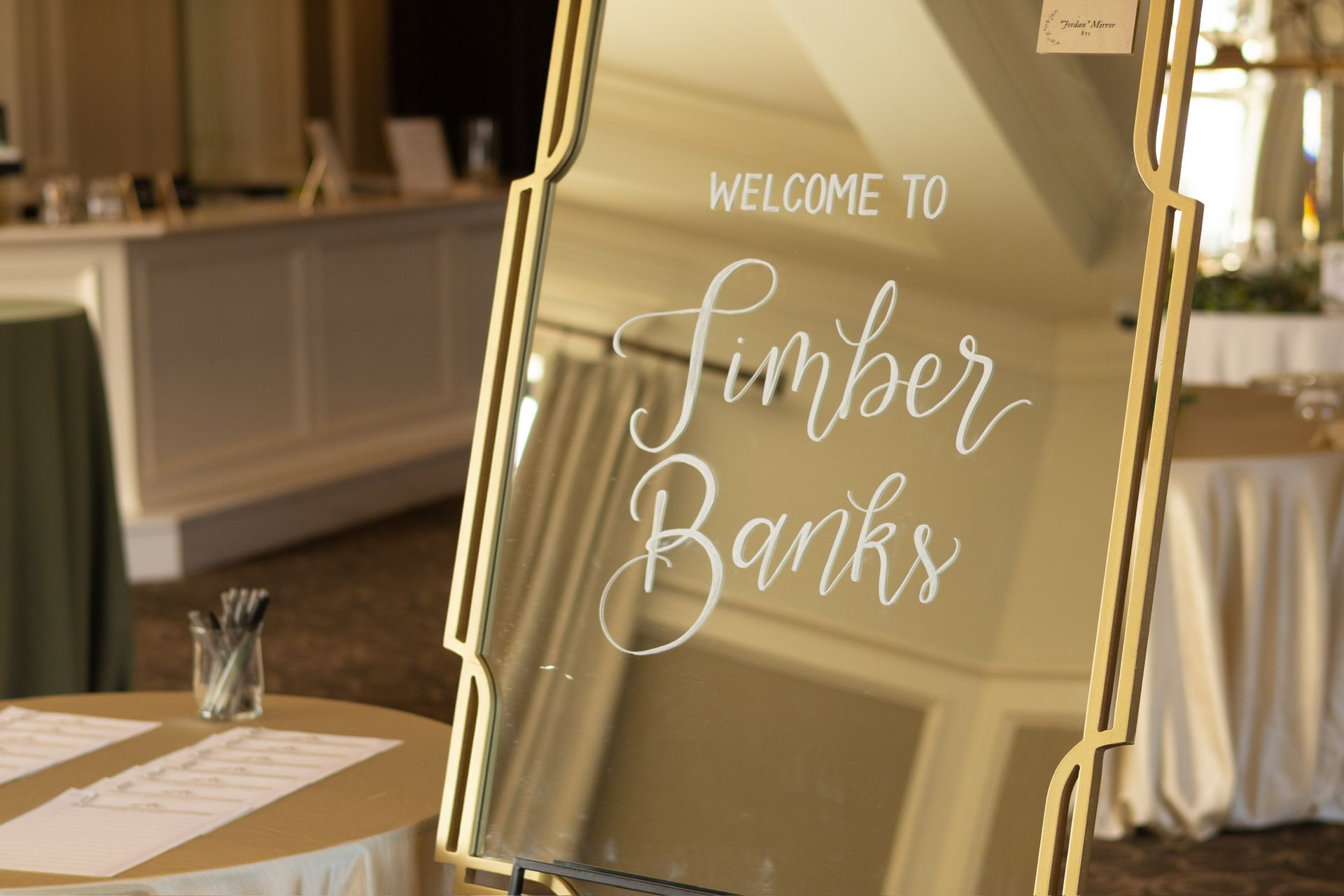 Mirror sign with gold frame, script 