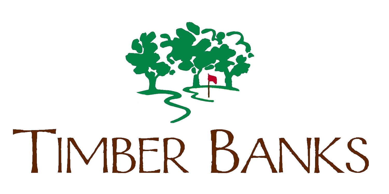Timber Banks logo: Green trees with a red flag over a winding path; brown text "Timber Banks".