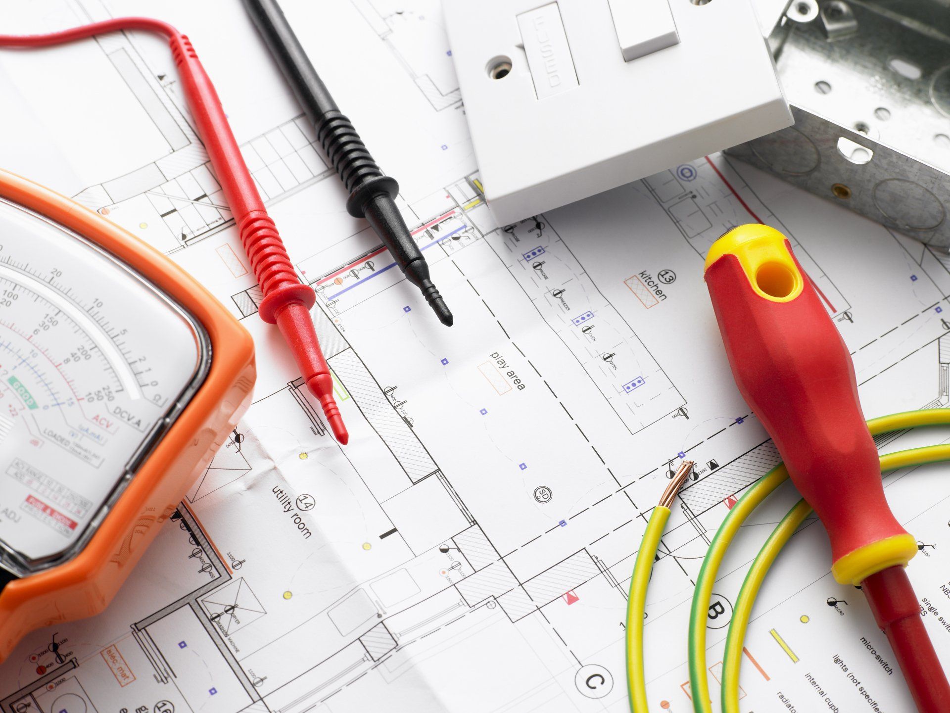 Electricians Tools Are Laid Out On A Blueprint — Mingleford Electrical Airconditioning Solar & Gas In Elimbah, QLD