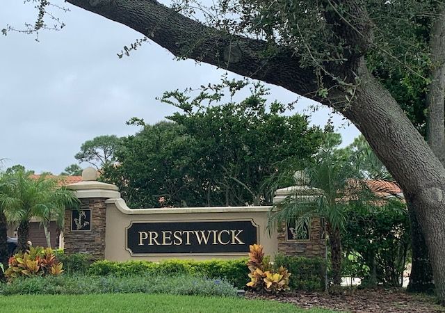 A sign in front of a house that says priestwick