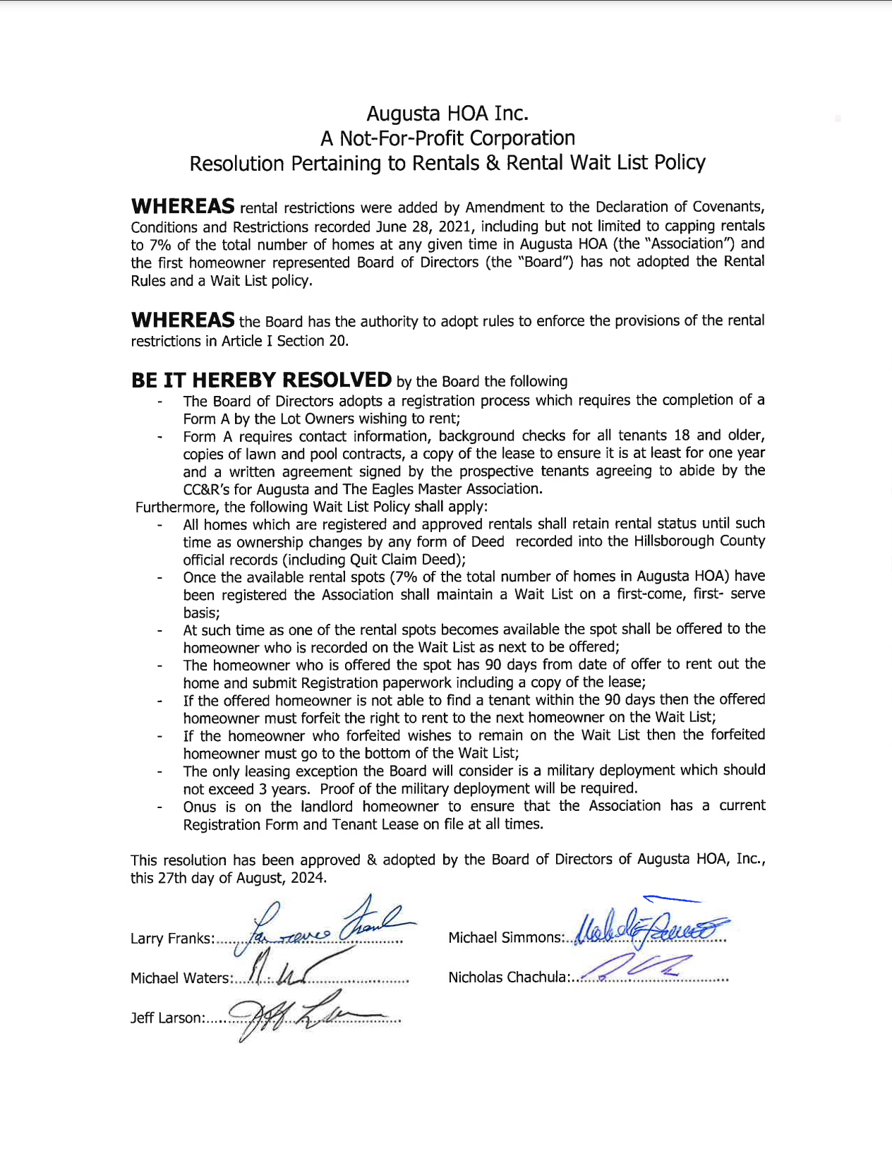 A black and white document with a signature on it.