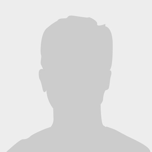 Gray silhouette of a person with shoulders and head on a light background