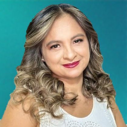 Woman with wavy, highlighted hair smiles at the camera. She wears a white top, lipstick, against a blue-green gradient.