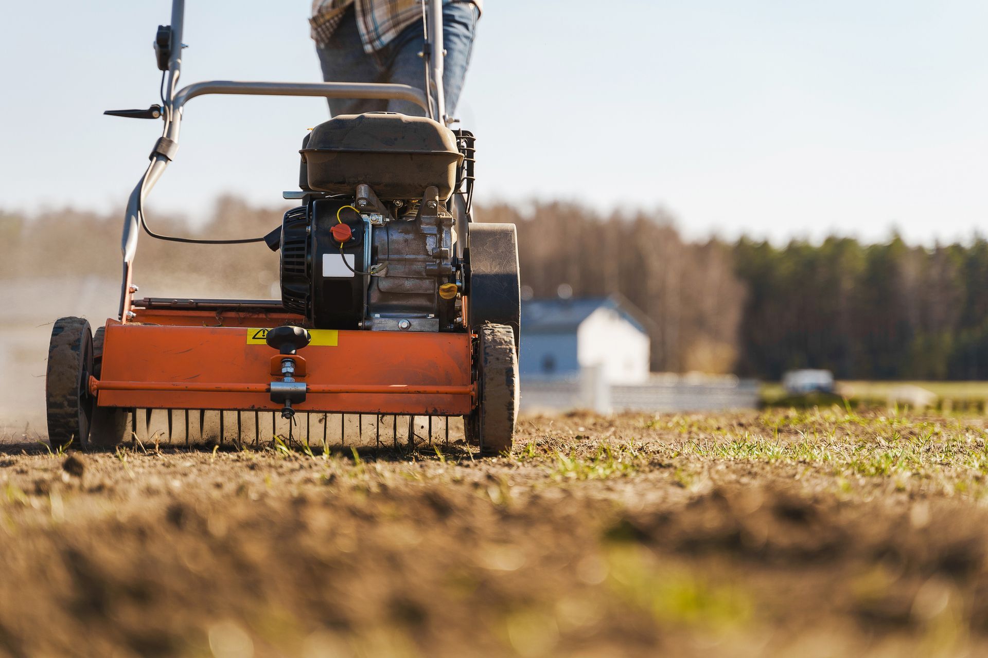 Man using aerator machine - Drumore, PA - Tanglewood Lawn Service