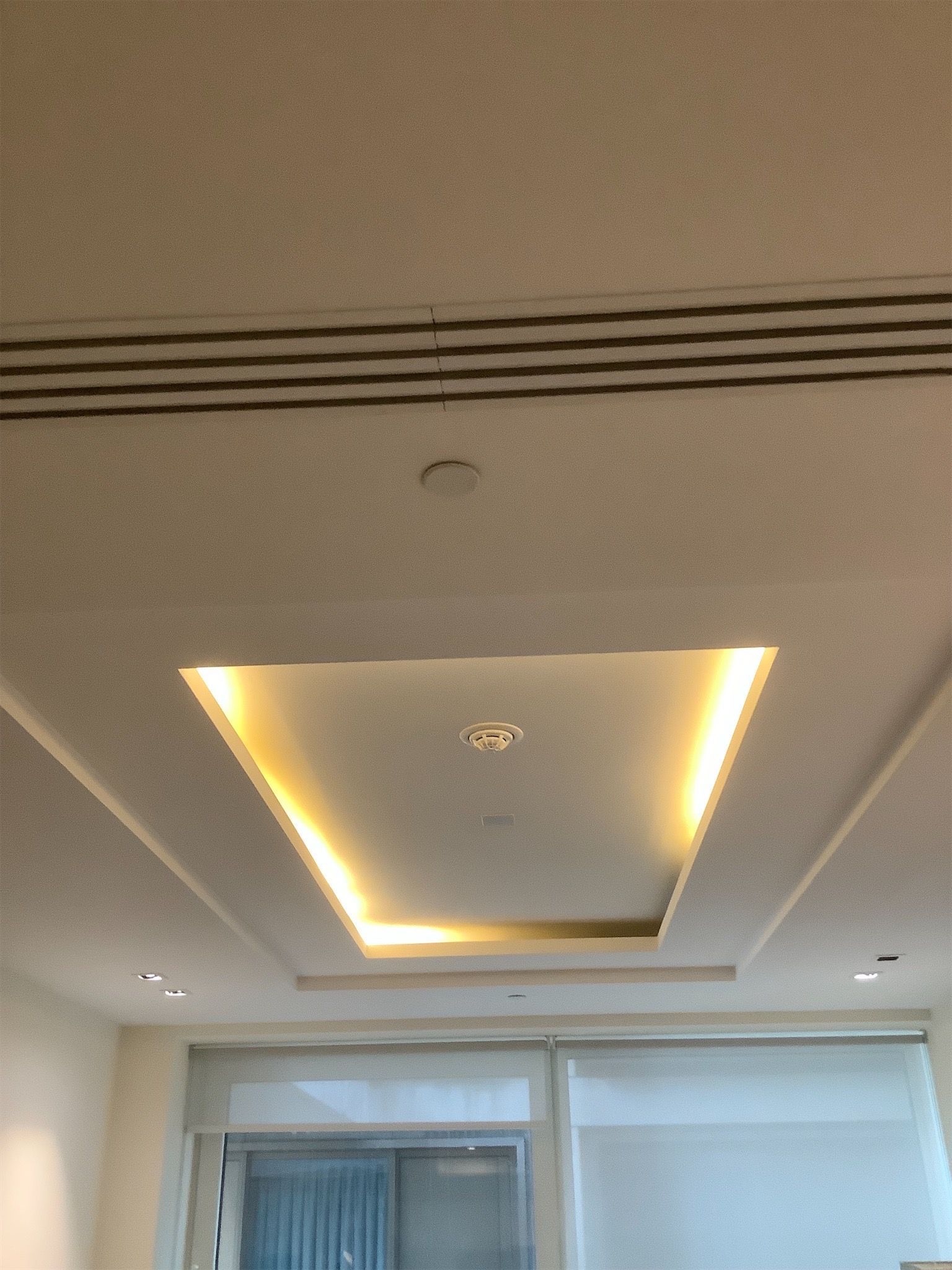 Tray ceiling with recessed lighting photographed during property inspection