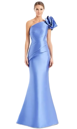 Woman in a periwinkle, one-shoulder formal gown with a rosette detail, posing against a white background.