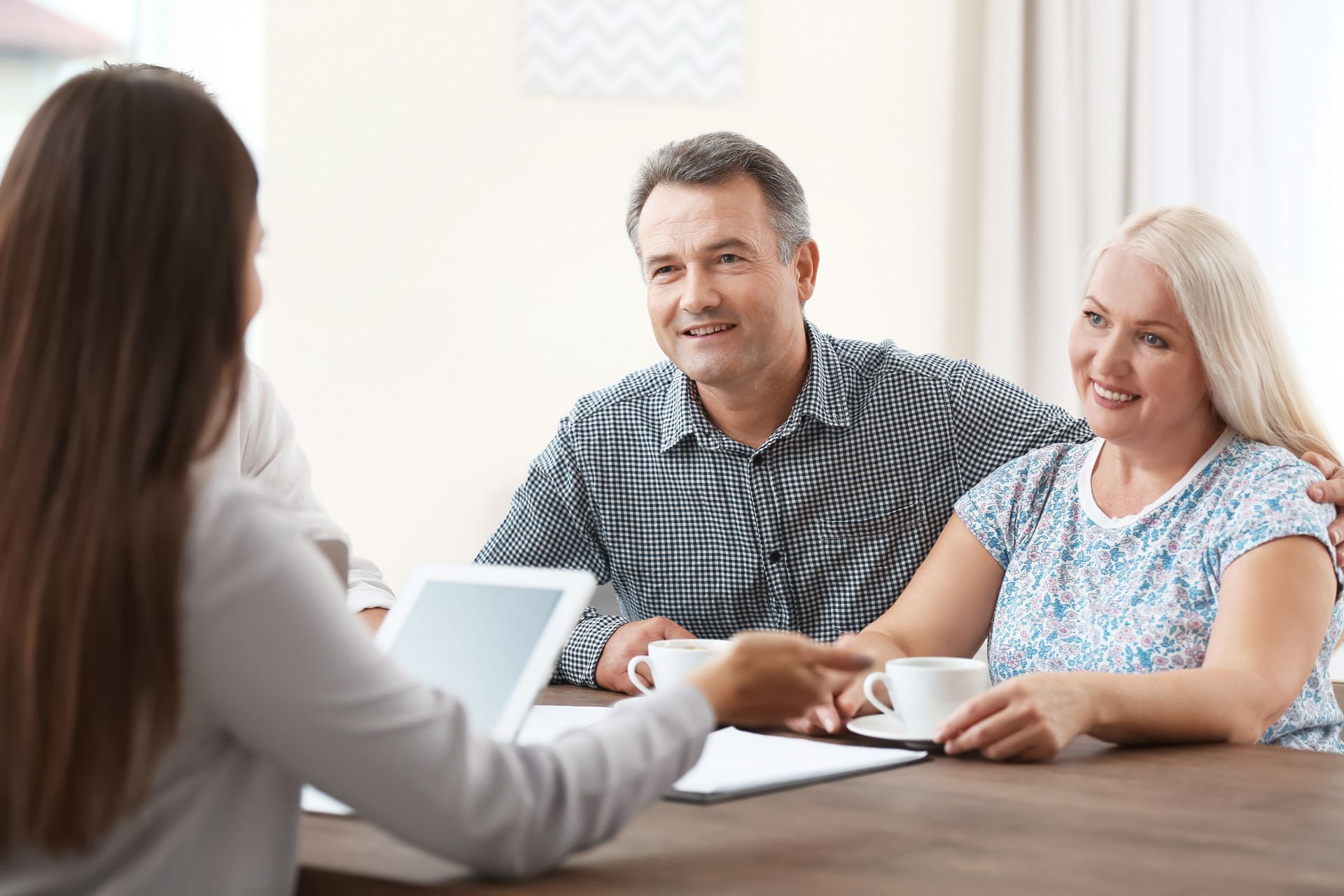 Family couple consultations with a lawyer or insurance agent.