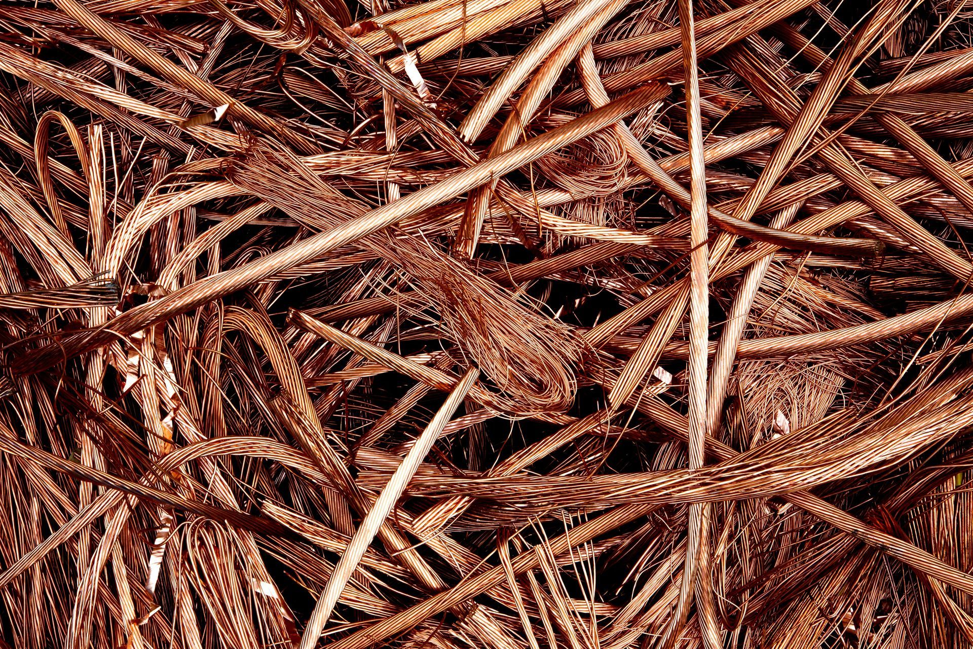 Pile of tangled copper wires in a close-up view